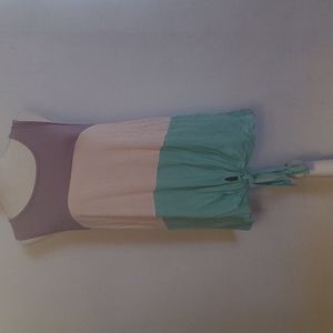 Small tank top with tie at the bottom